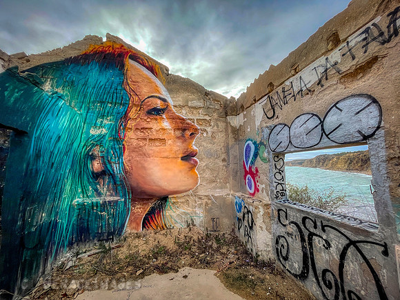 Graffiti mural by Def Notes, Praia das Cabanas Velhas, Budens.