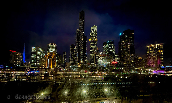 Hotel room view of the Yarra District & Melbourne skyline.